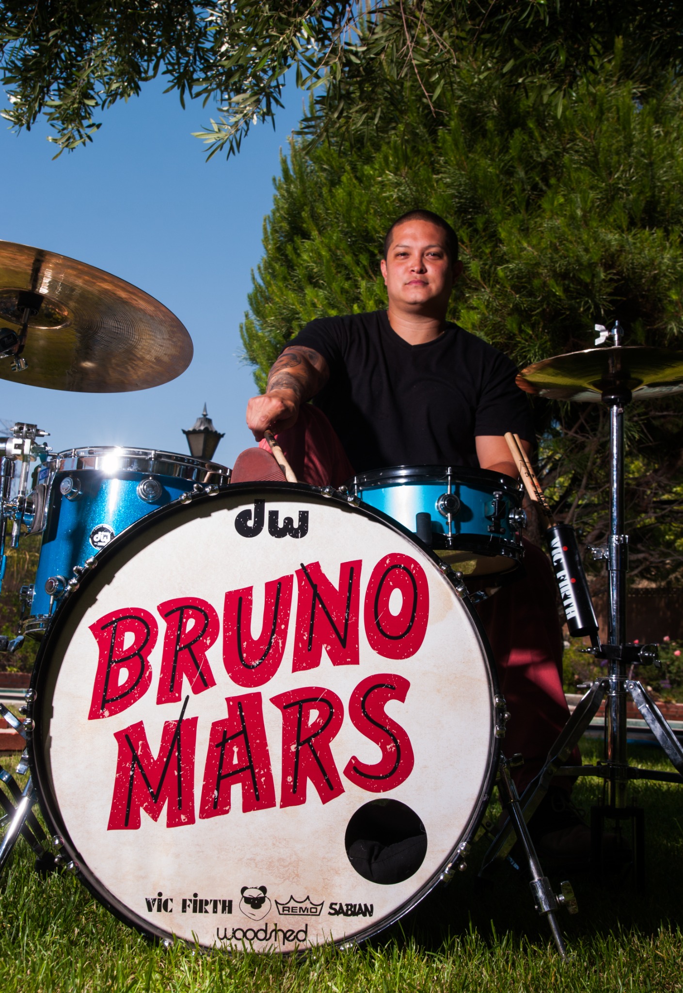 Bruno Mars drummer — on kit outdoors